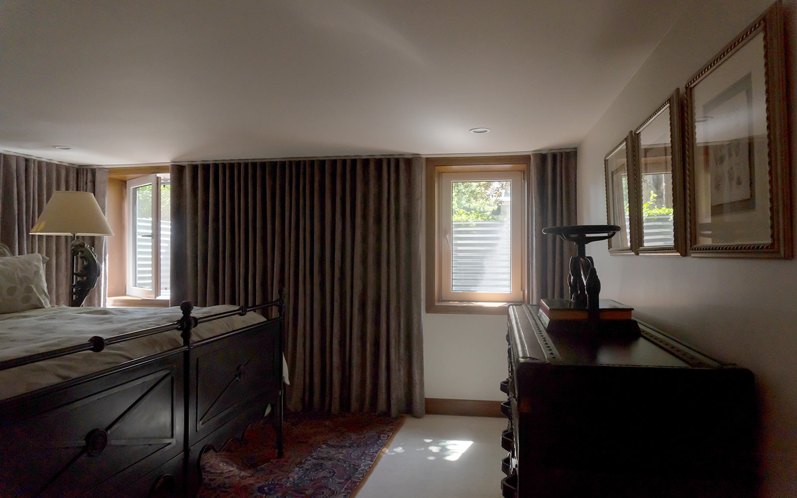 Dual egress window installation in basement bedroom